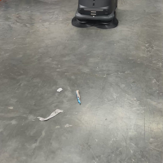 MT1 Sweeping Robot in action cleaning debris in a workshop From Robot Solutions QLD